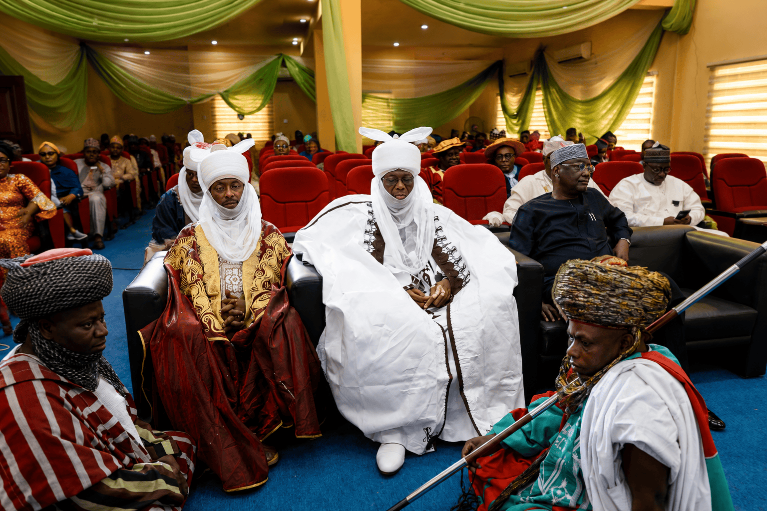 Traditional Nigerian leaders in ceremonial attire at Al-Muhibbah Open University event.